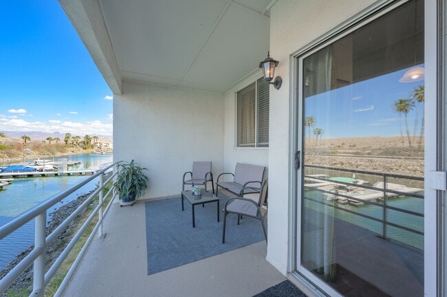 Building Photo - Live ON THE COLORADO RIVER – Fully Furnished 1 Bed/1 Bath Condo in the Gated Community of Roadhav...