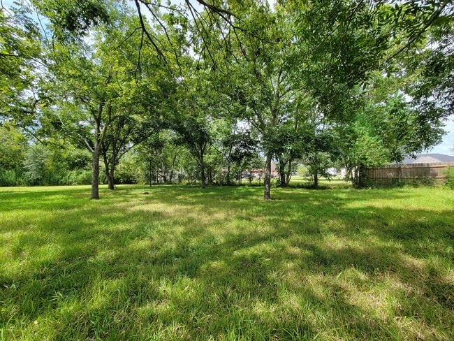 Building Photo - REMODELED 4 BEDROOM 2 BATH LEASE HOME IN A...