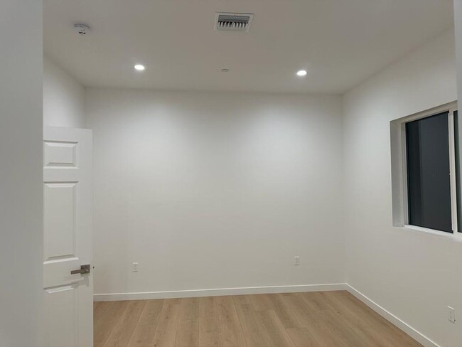 Building Photo - 9308 E Ave T 6