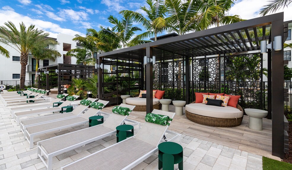 Rest and recharge at the poolside cabanas - Solea at Miami Lakes