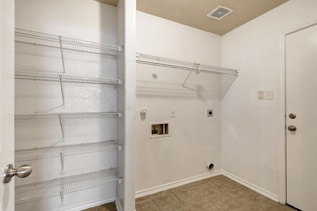 Building Photo - Stylish Two-Story Residence with Modern Co...