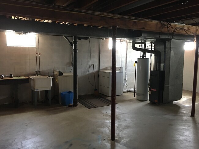 Building Photo - $1142  includes water, sewer and trash for this very clean  2 Bedroom twinplex with central air