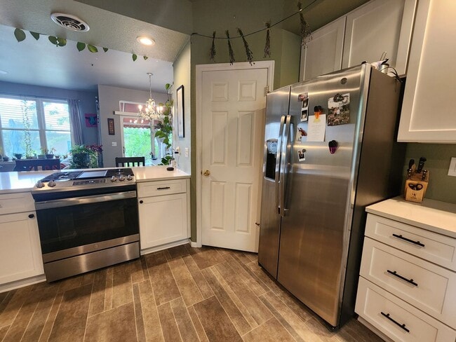 Building Photo - Stunning 3 Bedroom Townhome Tucked Away In...