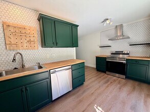 Building Photo - Charming West Nashville Condo with Designer Kitchen & Private Patio Access