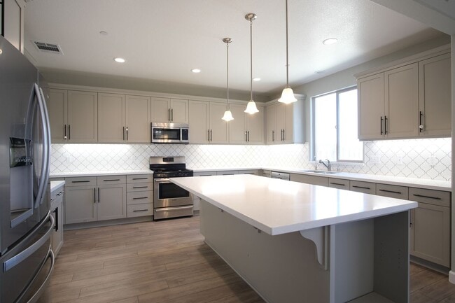 Building Photo - Available now! Beautiful Newer Home in Man...