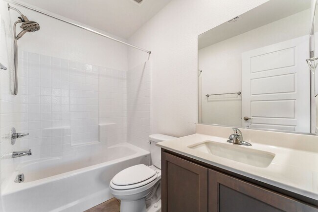 Building Photo - Modern Gated Townhome Living with Resort-Style Community Amenities