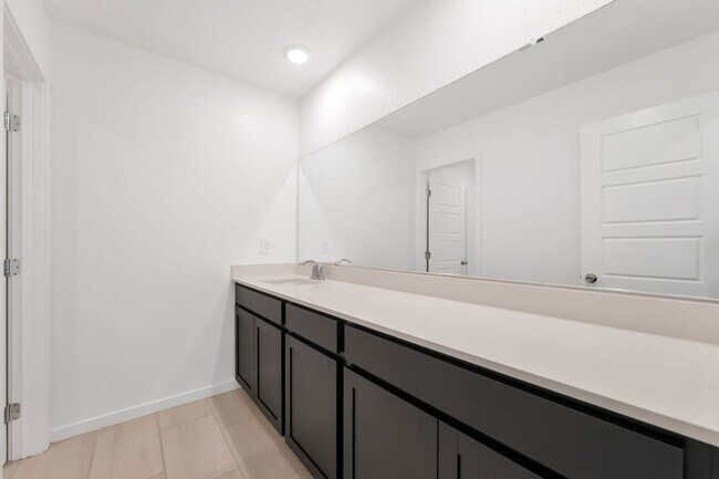 Building Photo - Modern Cadence Townhome with Sleek Finishes & Open-Concept Living!