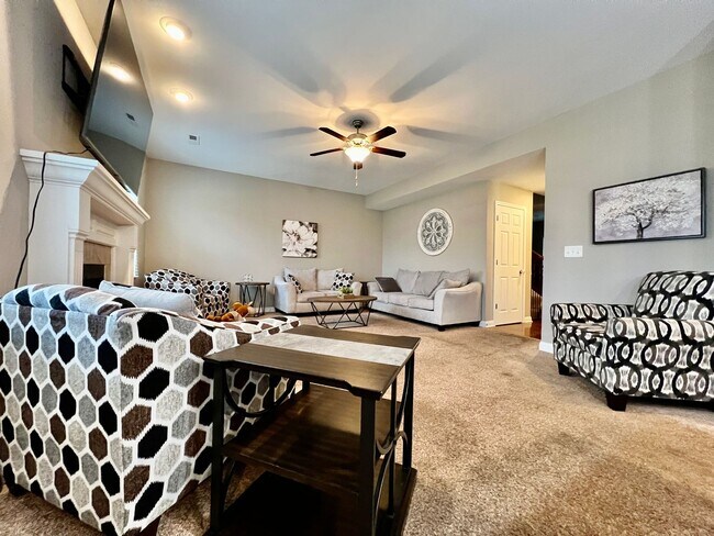 Building Photo - Executive corporate rental features community pool. Fully furnished and includes all utilities.