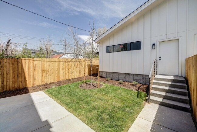 Back yard, garage in background - 3420 S Grant St