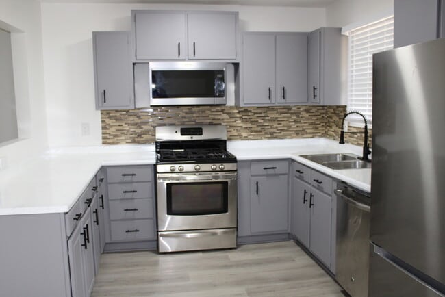 Building Photo - Move in Special - Spacious 4 bedrooms and ...