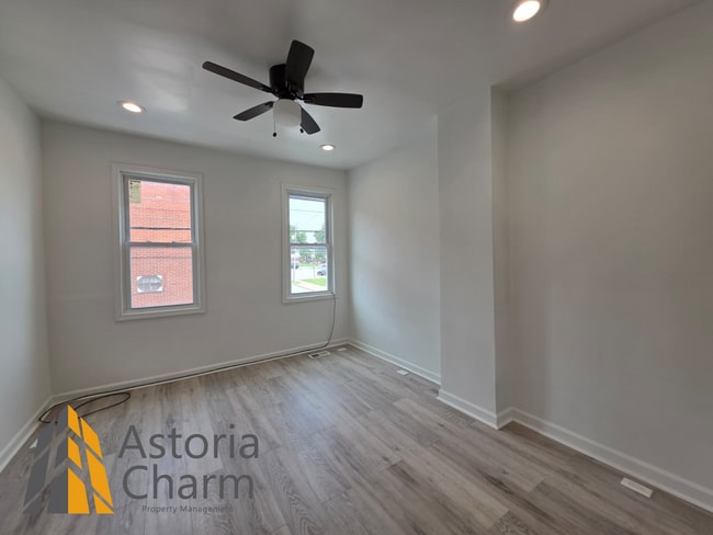 Building Photo - 3 Bedroom End Unit with Finished Basement and Fenced Yard on E 28th Street
