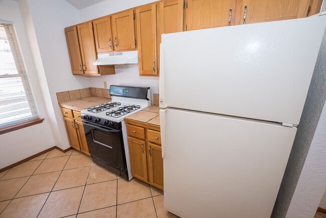 Building Photo - Contemporary home with 3 bedrooms, 2 bath, 2 car garage, A/C, Fenced Yard