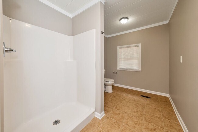 Building Photo - Beautifully Renovated Docena Home – Pet Friendly & Move-In Ready!