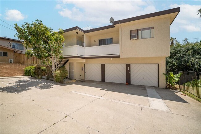 Building Photo - 7100-7104 1/2 Kittyhawk Ave. 1/2-7102