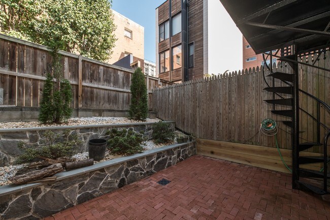 Building Photo - Available Now! Modern Row House in the Heart of Foggy Bottom with 1 Car Garage!