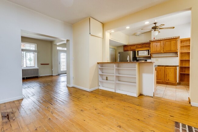 Building Photo - AVAILABLE June 2026 - Beautiful 4 Bedroom, 2 Bath Home w/ Front Porch Swing!