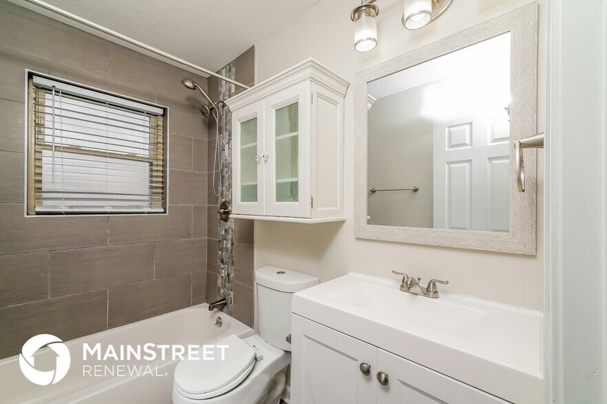 Building Photo - 7709 Mango Dr