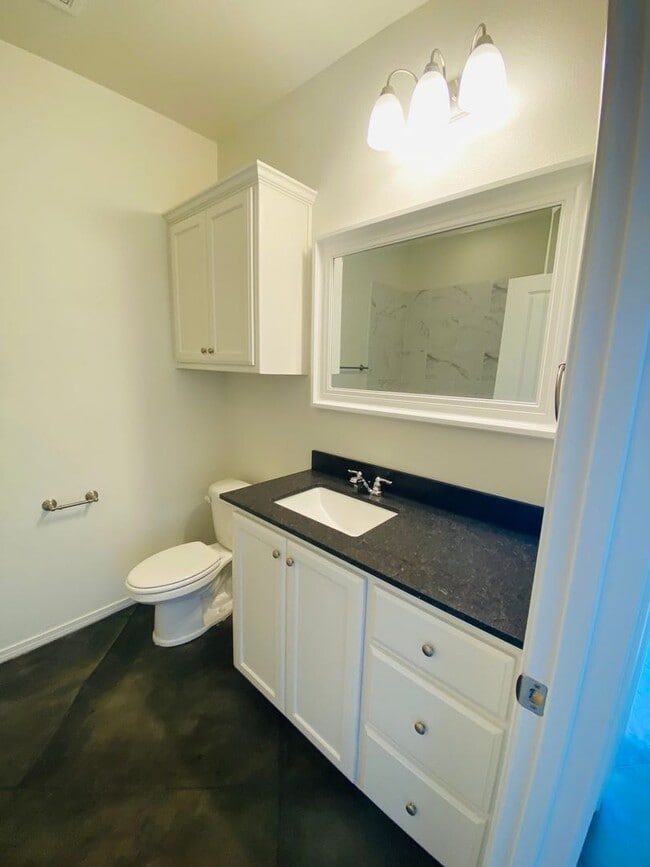 Building Photo - Stunning New 3/2 Townhomes