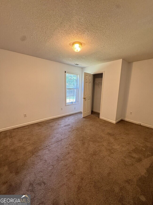 Building Photo - 6922 Red Bone Way