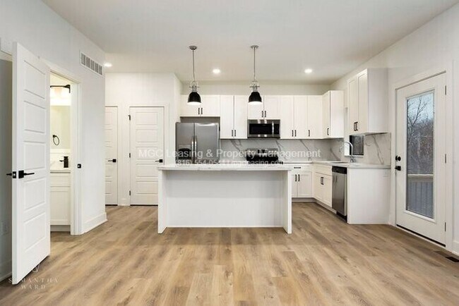 Building Photo - Highly sought after Ayden Place Duplexes with a 2-Car Garage in Kansas City!