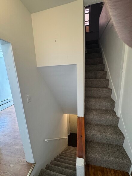 Stairs to Side Alley Entrance and to Top Floor - 4052 Penn Ave