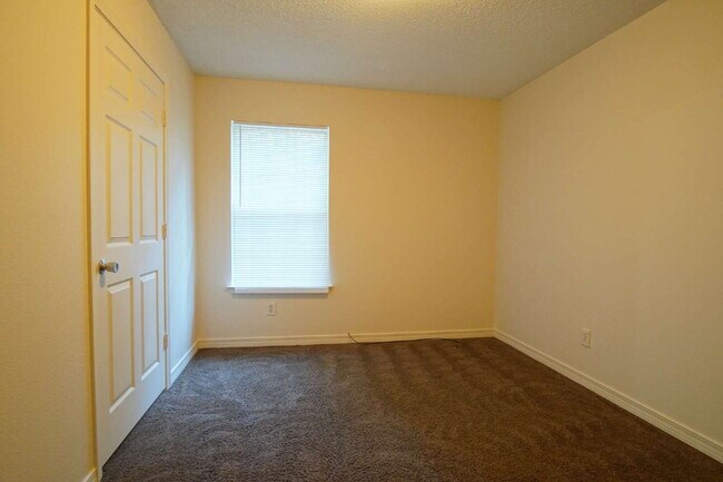 Building Photo - Pace 3BR Patio Home with Fenced Backyard & Open Floor Plan