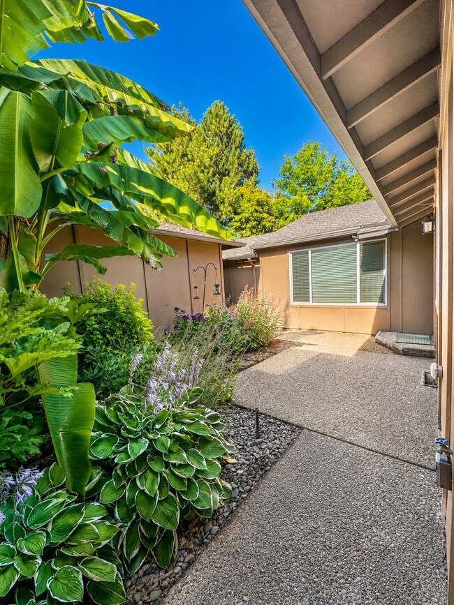 Building Photo - Remodeled Single-Level 2BR/2BA End Unit — Private Courtyard, 2-Car Garage & Mountain Park Ameniti...