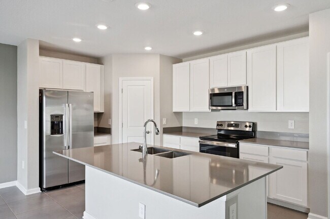 Building Photo - Spacious 4-Bed Retreat with 2.5 Baths in Davenport, FL – Your Next Rental Home Awaits!