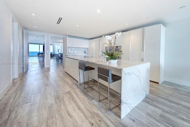 Building Photo - 10203 Collins Ave