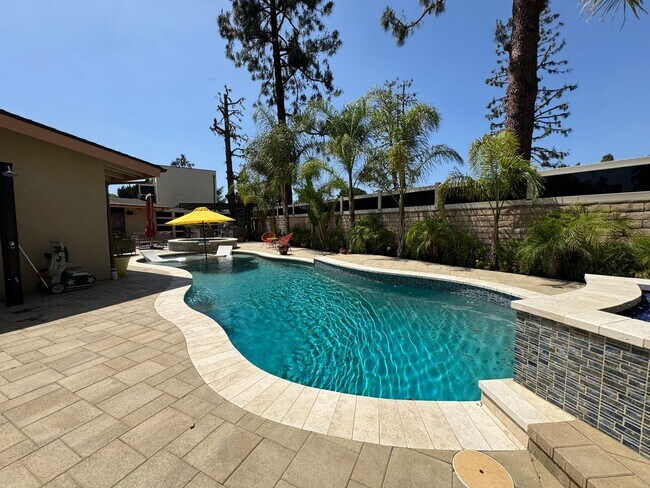 Building Photo - Luxurious Oasis with Resort-Style Pool and...