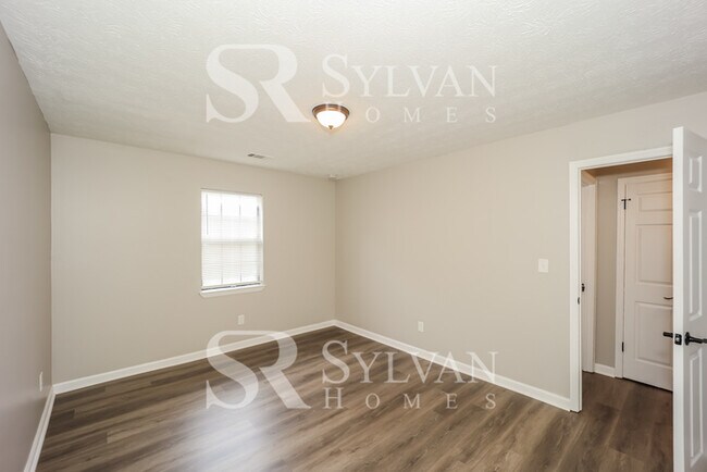 Building Photo - Lease today! No extra charge for contentme...
