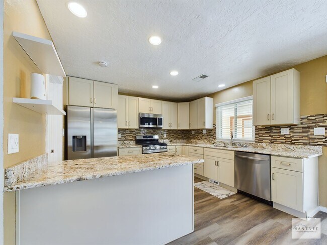 Building Photo - Beautifully Remodeled single Level Home Av...
