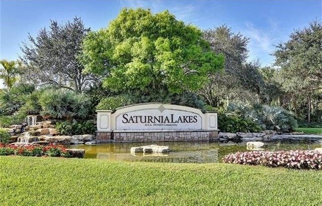 Building Photo - ***PET FRIENDLY***SATURNIA LAKES - 3 BED /...