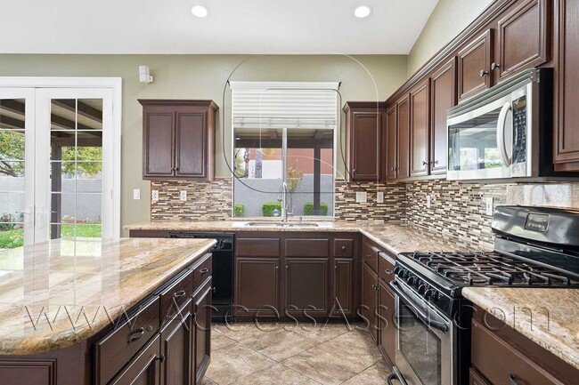 Building Photo - A Beautiful Corona Home Designed for Open Space and Comfortable Living