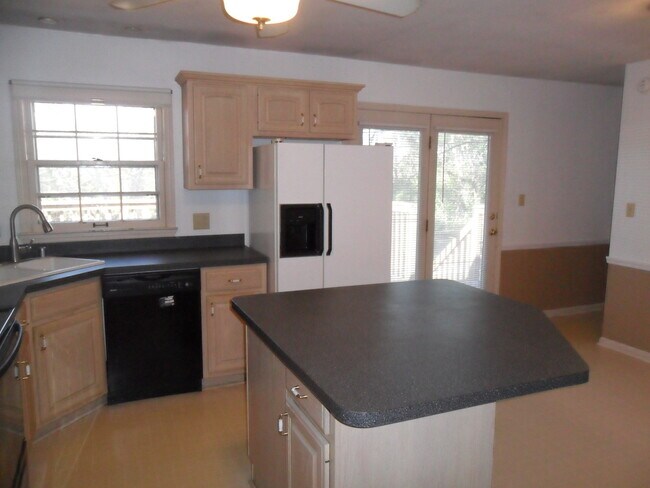 Building Photo - COMING SOON! Spacious Home w/ Finished Basement, Fenced Backyard & Garage!