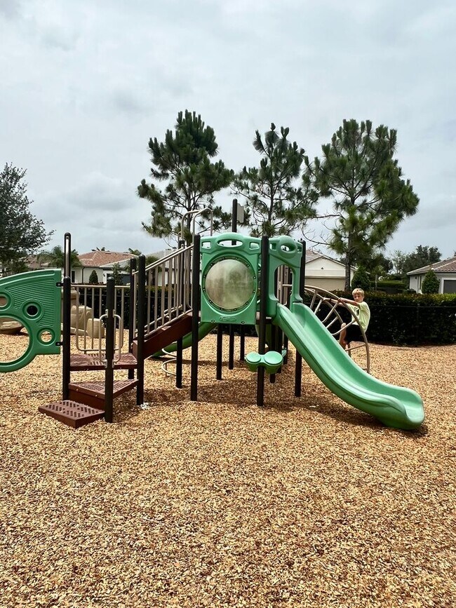 Building Photo - STUNNING LAKEFRONT 3 BEDROOM, 2.5 BATH HOM...