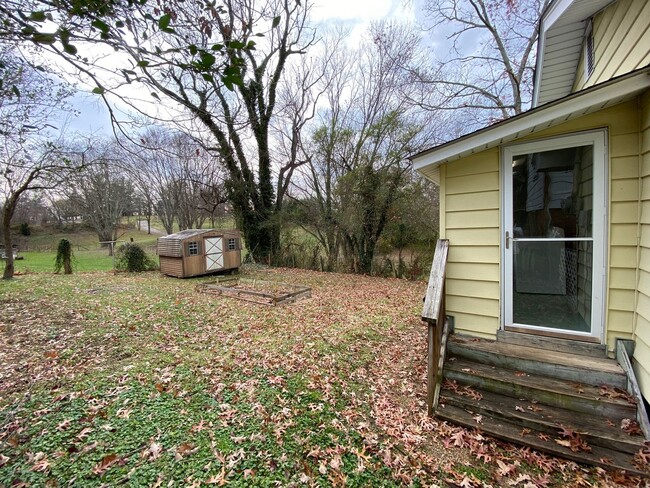 Building Photo - Woodfin - Traditional Bungalow with lot's ...