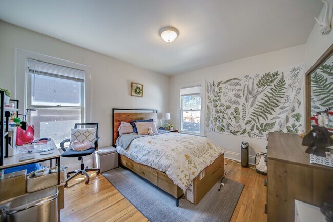 Building Photo - Charming 5-Bedroom Home with Exposed Brick and Modern Upgrades