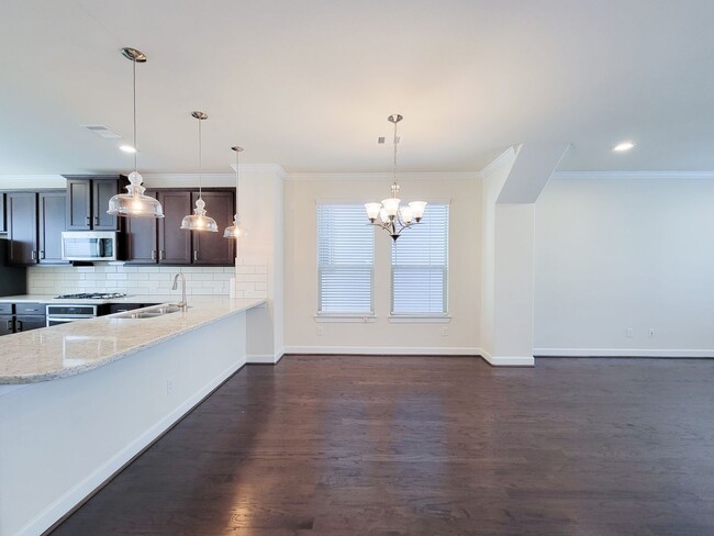 Building Photo - A stunning 4-story home perfectly situated in the heart of Spring Branch!