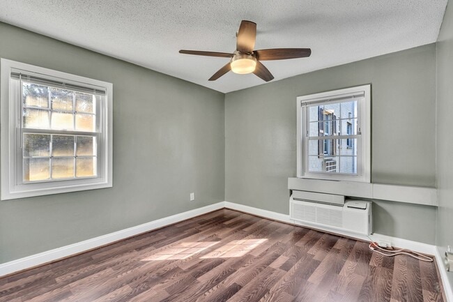 Building Photo - Utilities Included! Updated 2-Bedroom Condo Just Steps from Huntington Metro