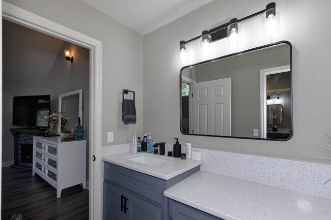 Building Photo - COMING SOON · Designer Renovation · Covered Deck Pavilion · 2-Car Garage · Lawn Care Included