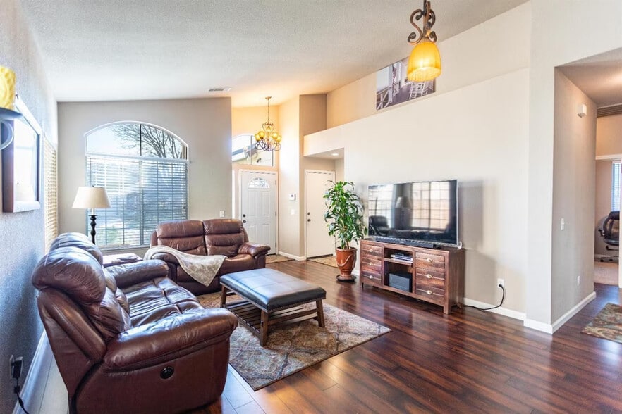 Living Room with Large Window & front door entrance - 9316 Caulfield Dr