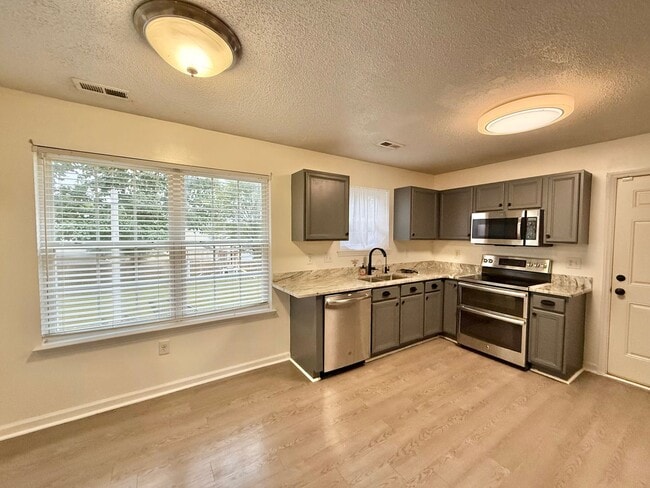 Building Photo - Newly Remodeled 4BD, 2.5BA Raleigh Home wi...