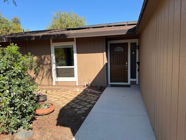 Building Photo - Four bedroom two bathroom home with a pool in Central Davis