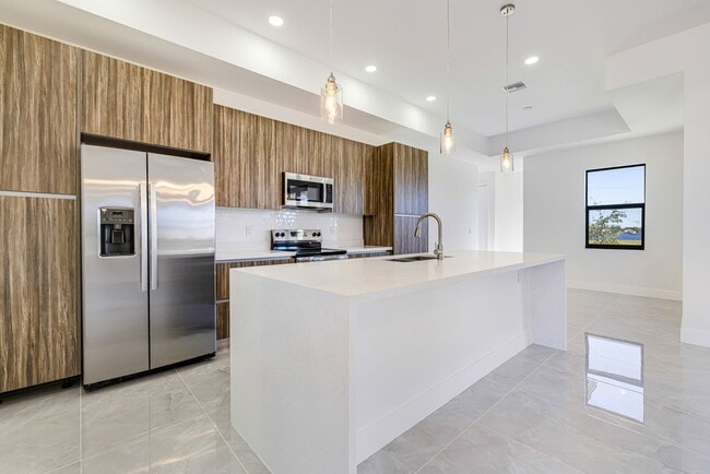 Building Photo - Brand-New Coastal Retreat | 4BR Home in NW Cape Coral