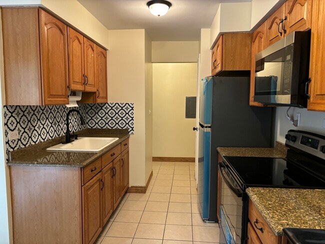 Building Photo - 1432 W Rosemont Ave