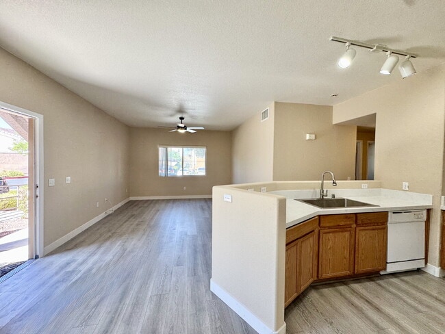 Building Photo - DOWNSTAIRS CONDO | GATED COMMUNITY | CENTENNIAL HILLS | UPDATED 3 BEDROOM