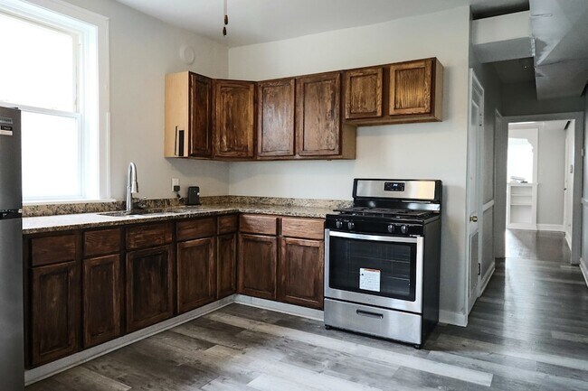 Building Photo - 6633 S Campbell Ave