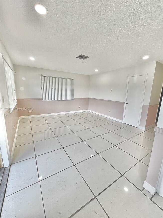 Building Photo - 6737 NW 6th Ct