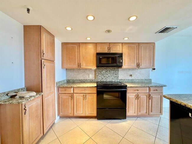 Building Photo - 5950 Pelican Bay Plaza S